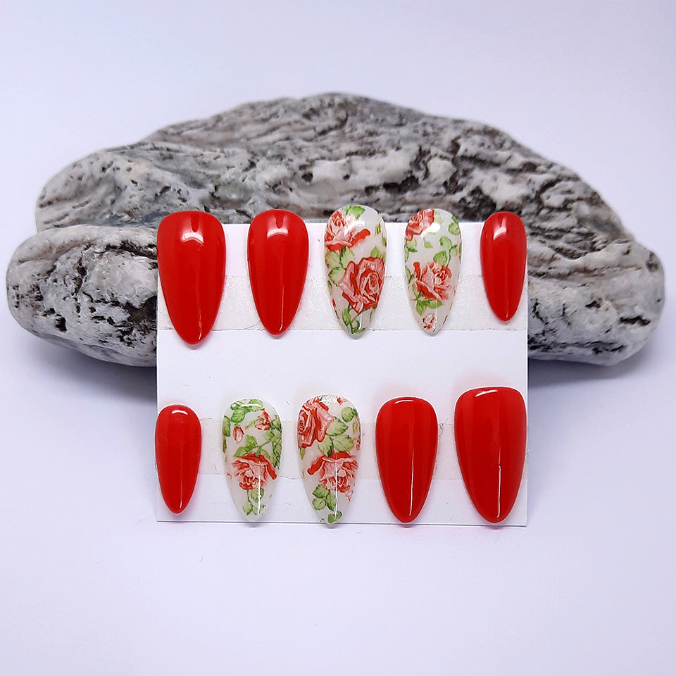 red nails with roses