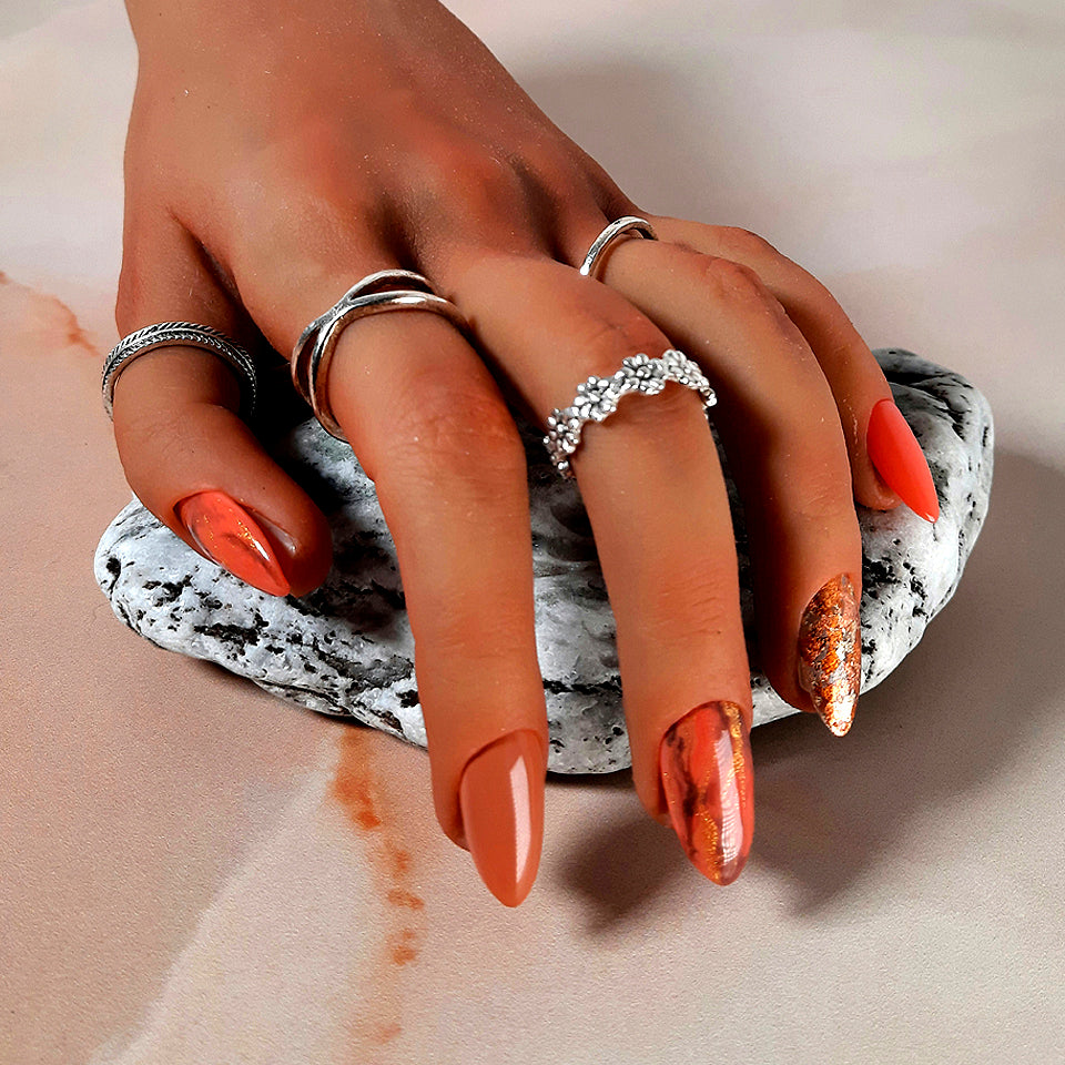 hand made short almond press on nails in Autumn colours with marble accents and foil
