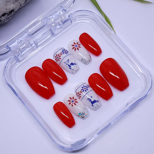 Lovely red and white Christmas press on nails, with a Christmas Reindeer jumper design and silver flakes, finished in a glossy top coat.
Please select your size, shape and length.