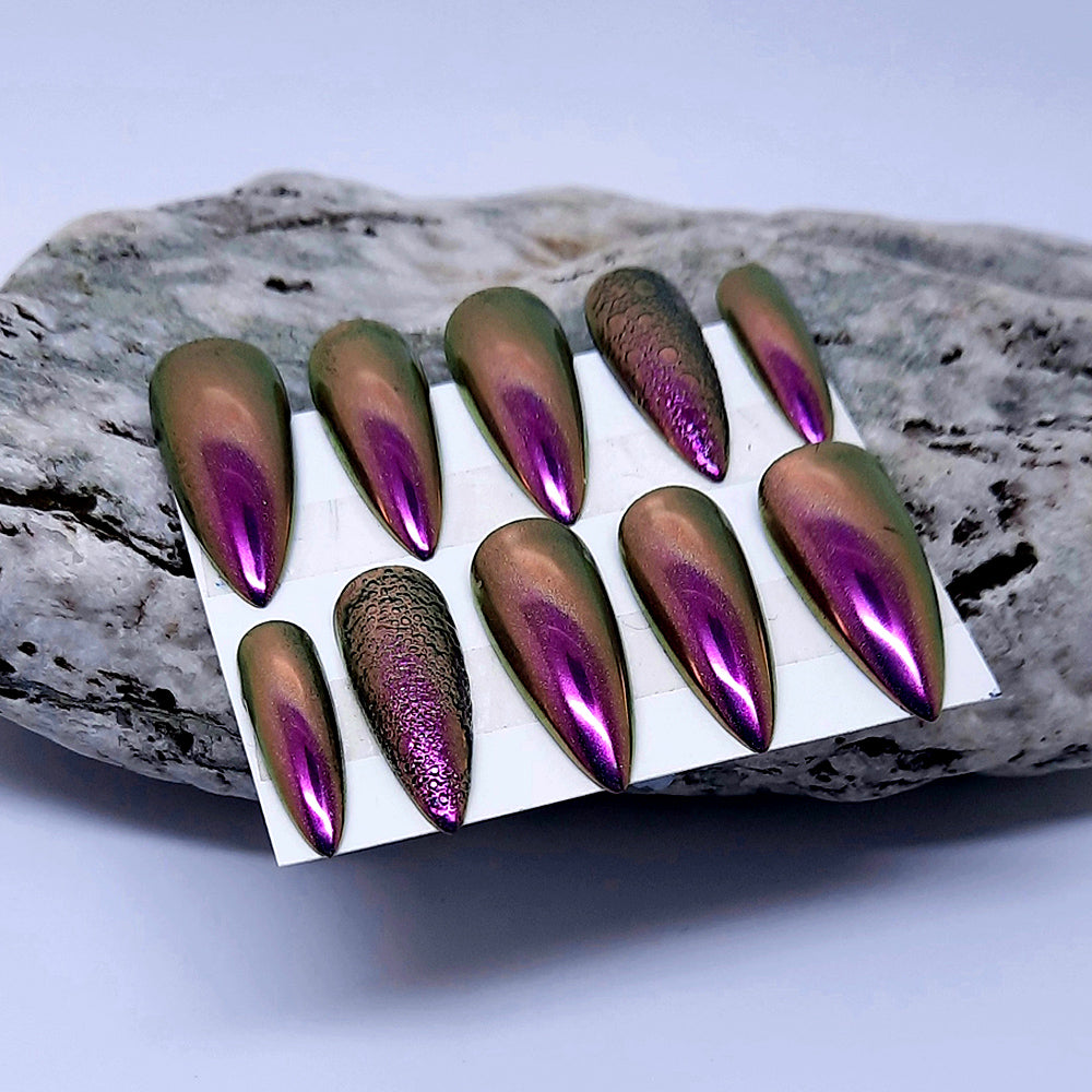 Stunning pink colour shift chrome hand made press on nails with bubble nail art accent.