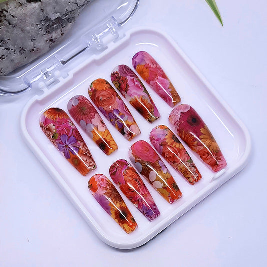 stunning hand made press on nails with an all over flower design