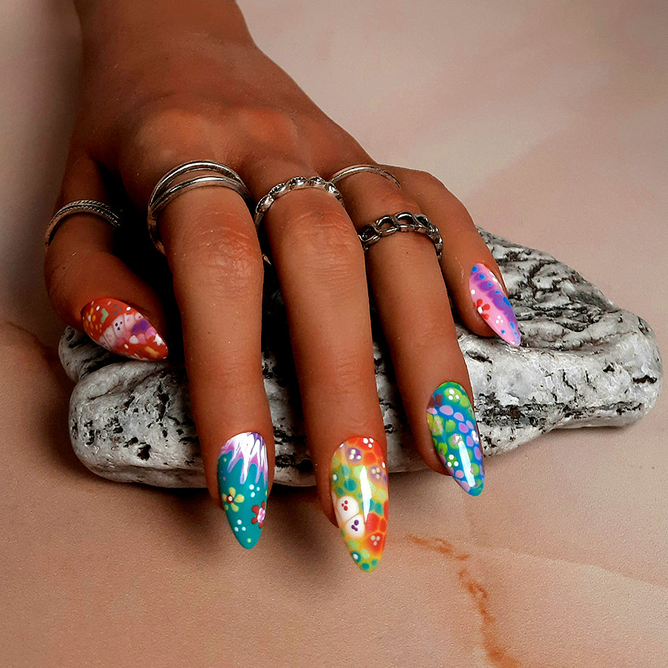 hand made press on nails with colourful hand painted flowers