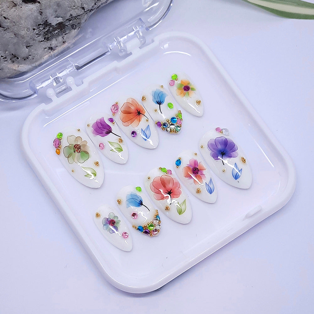 white almond hand made press on nails with flowers and gems