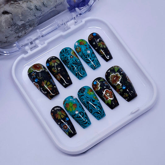 black and teal hand made press on nails with flowers and gems