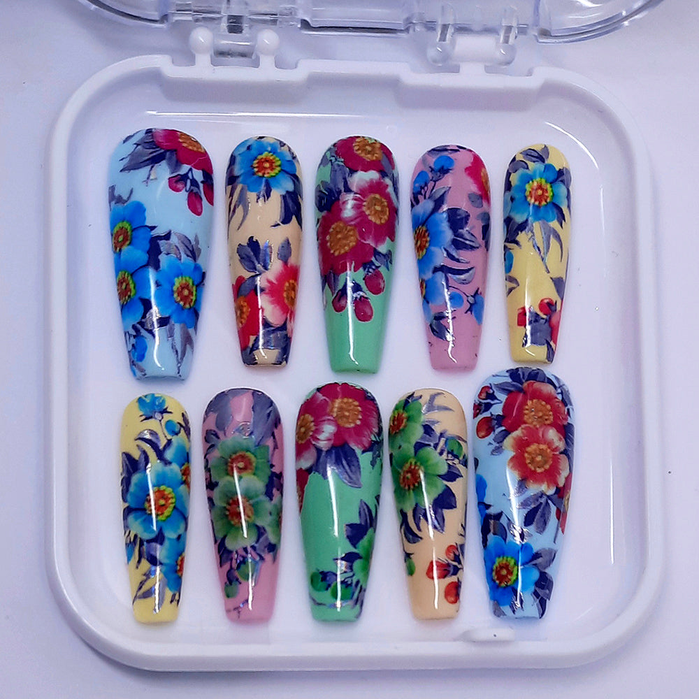 long coffin press on nails in soft pastel colours, with large vibrant flowers