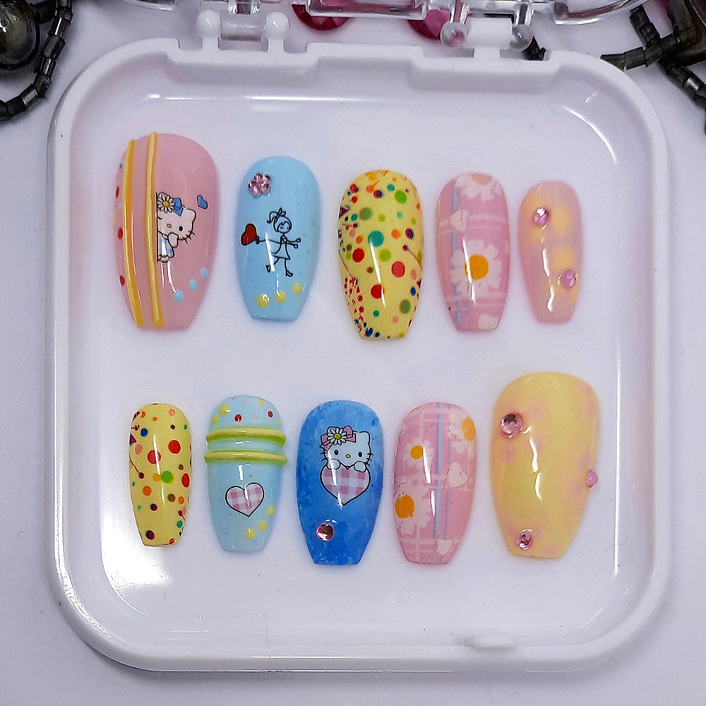 sweet pastel press on nails with dots, hearts and daisies, some pearls and gems and 3d lines