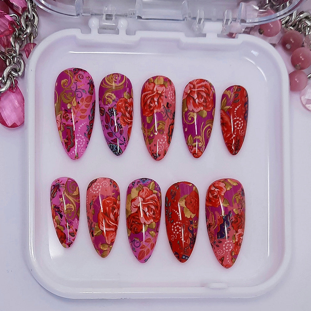 pink press on nails with a stunning abstract roses design
