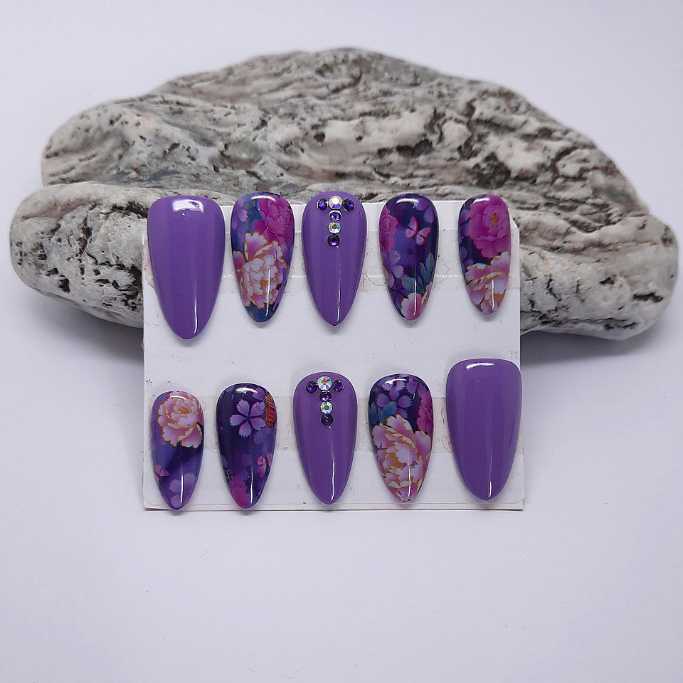 pretty hand made purple press on nails with flowers and gems
