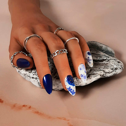hand made blue and white stiletto press on nails with blue flowers