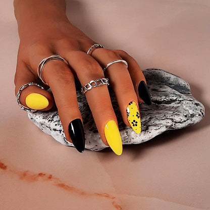 black and yellow almond press on nails with hand painted flowers