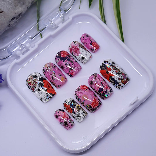 Gorgeous press on nails with a random abstract design made from nail foils. Finished with a glossy top coat.