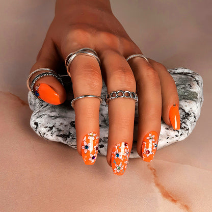 hand made orange short coffin press on nails with flowers and gems