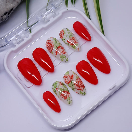 Stunning red and white press on nails with red roses, finished in a glossy top coat.

