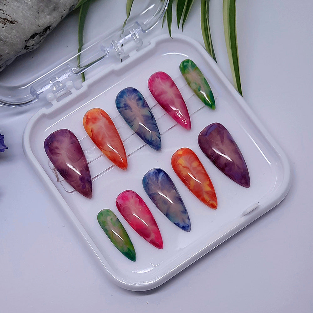beautiful hand made press on nails by Moona Nails, with a colourful marble design.