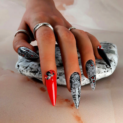 hand made red and black long stiletto press on nails with glitter, animal print and crystals