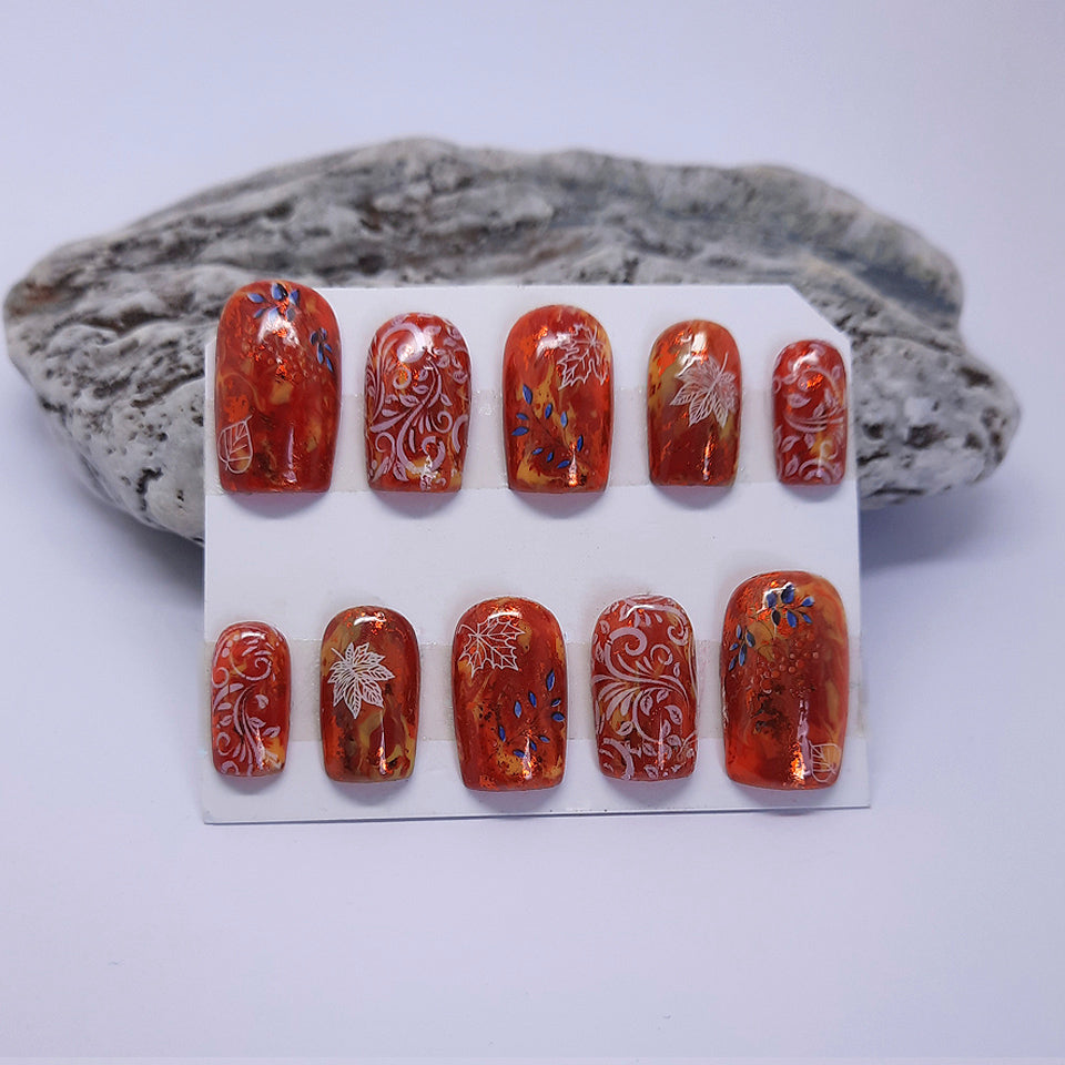 press on nails in rich Autumn colours and leaves