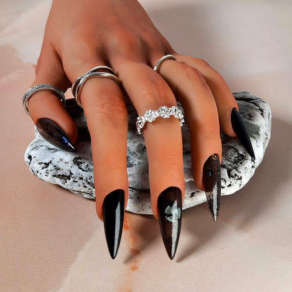 hand made black stiletto press on nails with a Halloween design