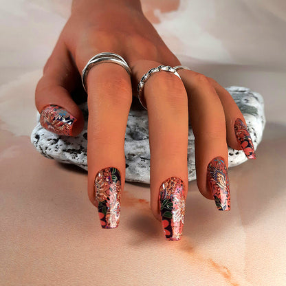 hand made medium coffin press on nails with an abstract floral deisgn with tapestry vibes.