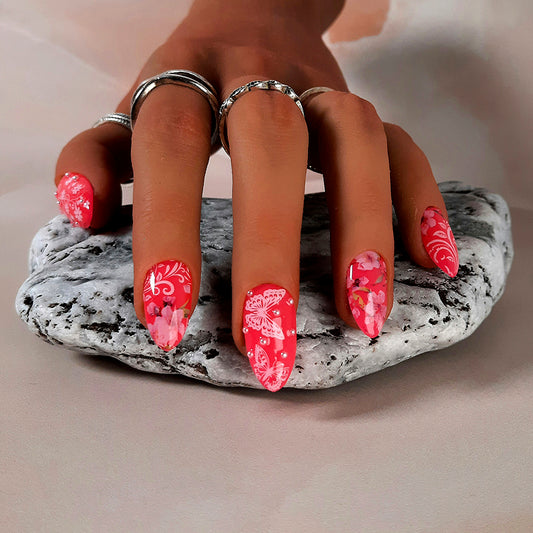 hand made pink press on nails with flowers, butterflies and pearls