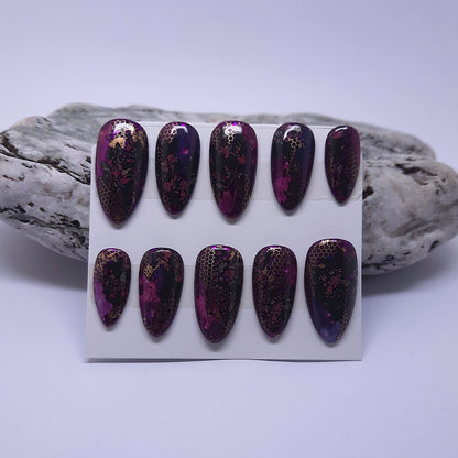 hand made press on nails in purples with an abstract design of flowers, and gold and purple foils