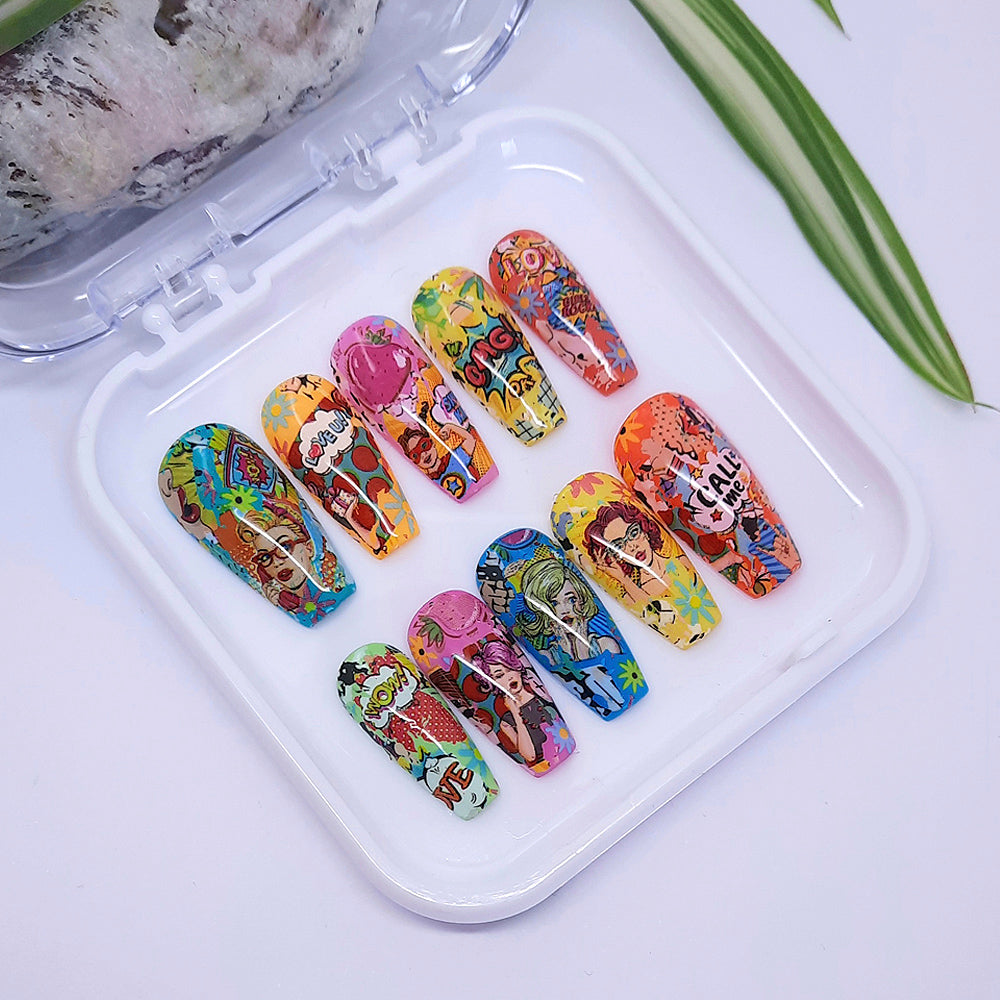 A stunning set of hand made press on nails with a colourful cartoon comic strip design.