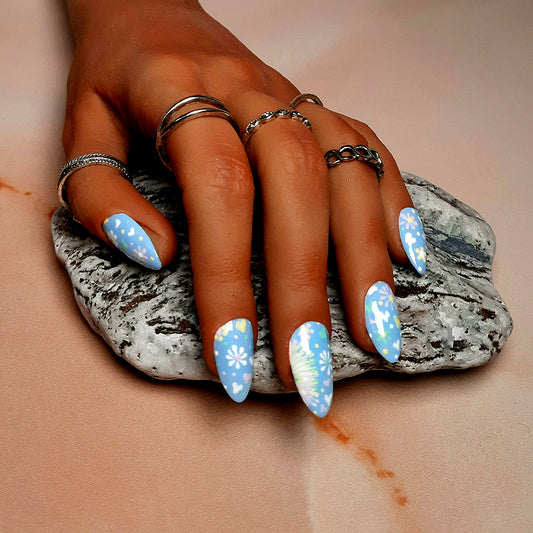 Pretty pastel blue press on nails with hand painted flowers and love hearts.