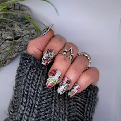 Pretty hand made press on nails in an abstract design with pink roses and animal print.