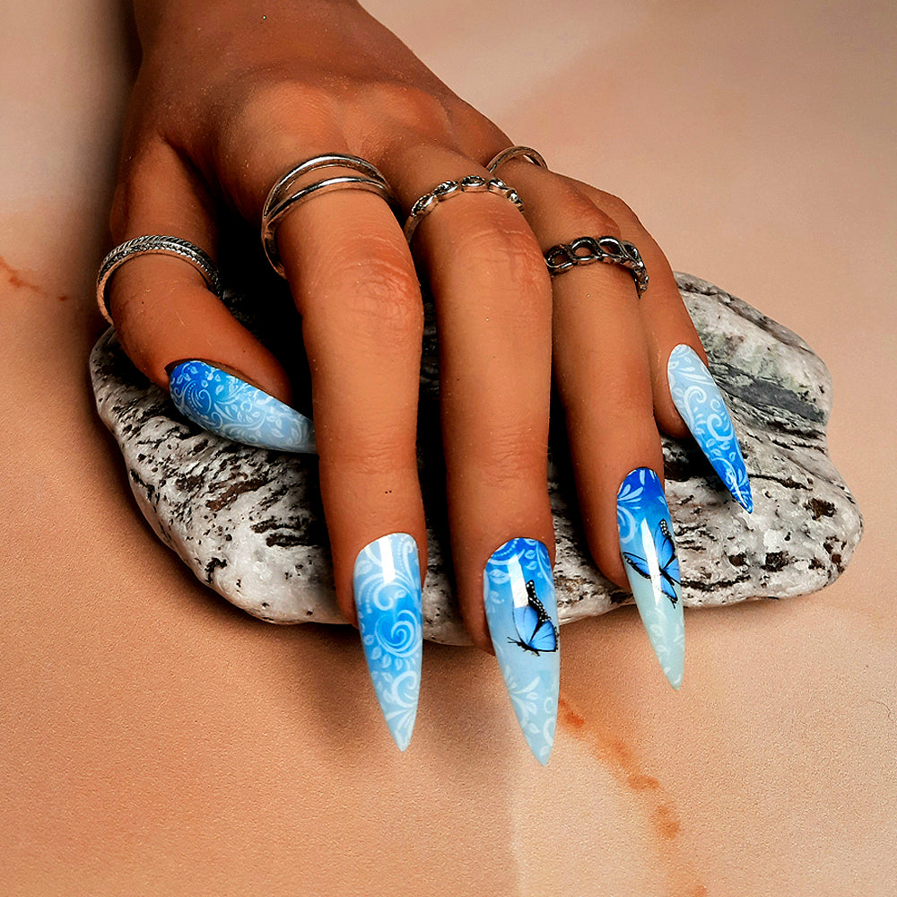 blue ombre hand made stiletto press on nails with butterflies.
