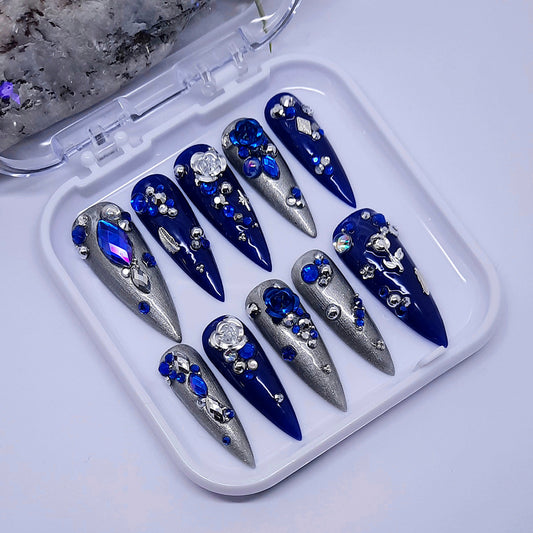 blue and silver hand made stiletto press on nails, with blue and silver 3d nail art