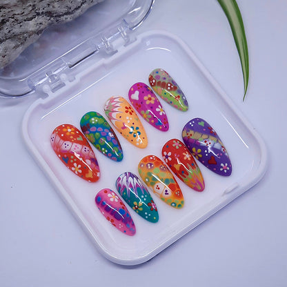 hand made press on nails with colourful hand painted flowers