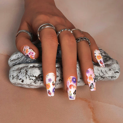 hand made coffin press on nails in soft colours with butterflies and flowers