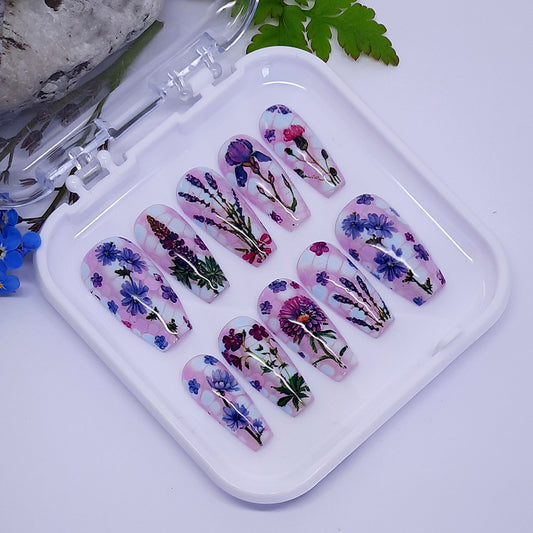 beautiful pink and blue hand made press on nails with flowers