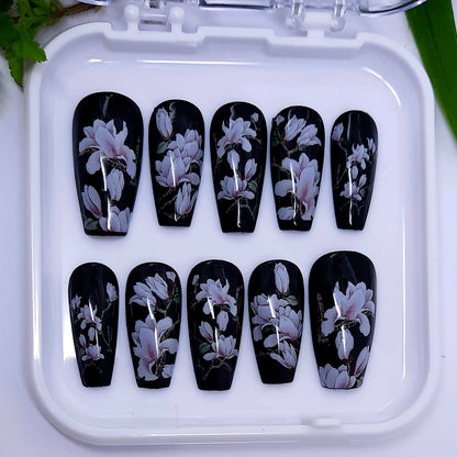 Beautiful classic black hand made press on nails with magnolia flowers