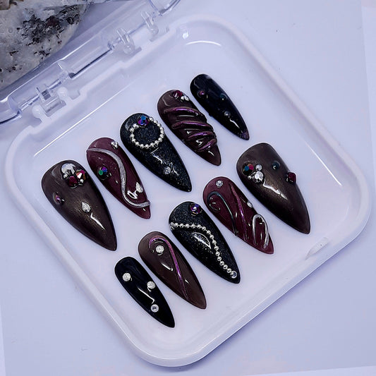 hand made stiletto press on nails with a funky 3d design