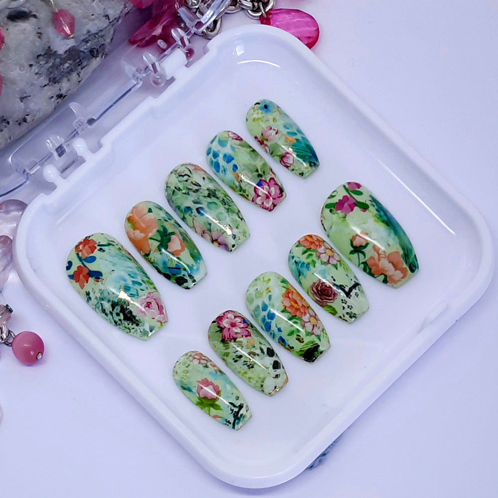 beautiful short coffin press on nails in green with an abstract floral design