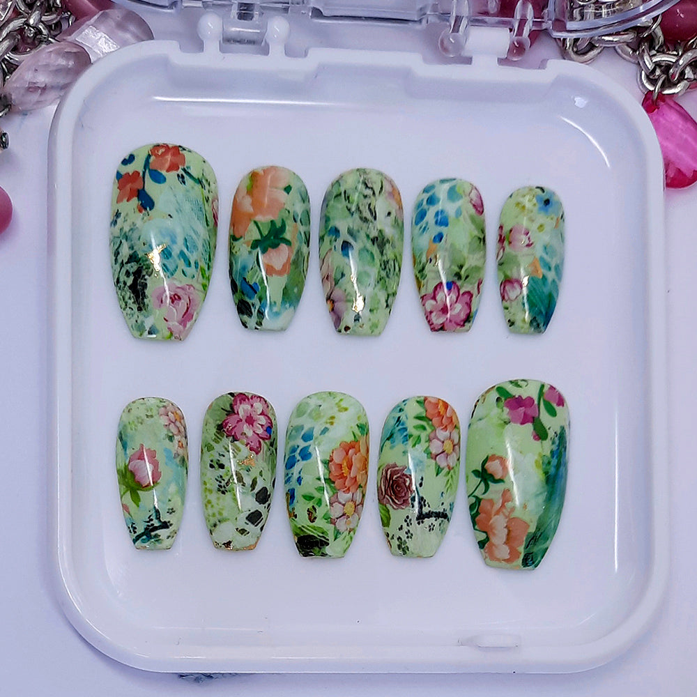 beautiful short coffin press on nails in green with an abstract floral design