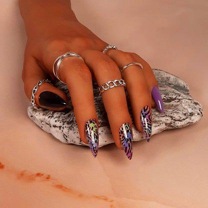 hand made stiletto press on nails in black and purple with animal print