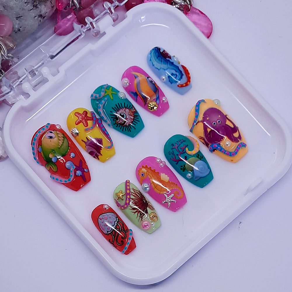 cute sealife press on nails with sea creatures, shells and pearls