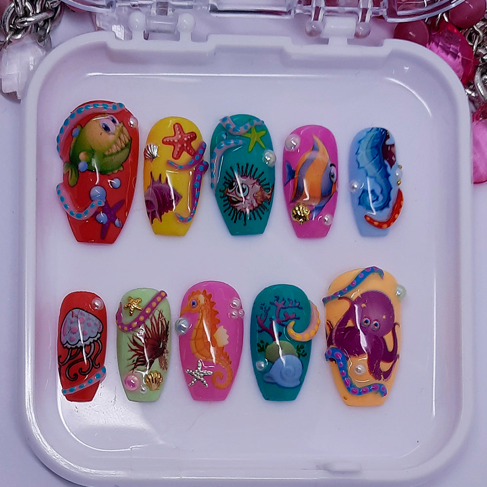 cute sealife press on nails with sea creatures, shells and pearls