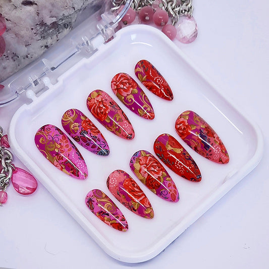 pink press on nails with a stunning abstract roses design