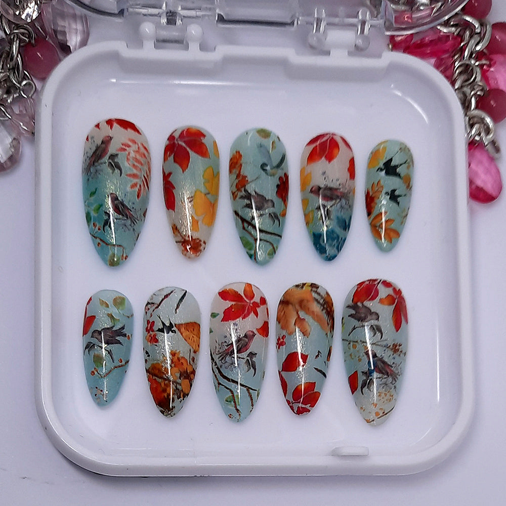 beautiful press on nails with birds and autumn leaves