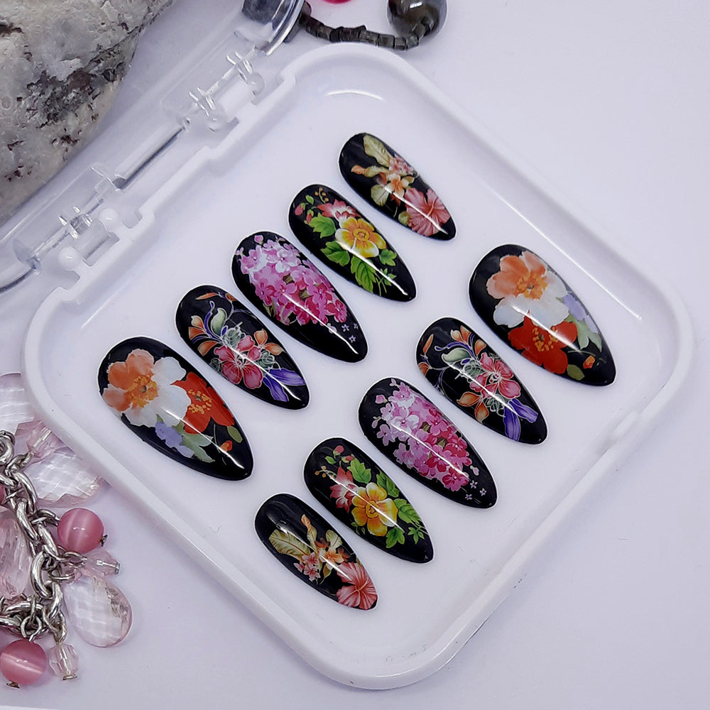 beautiful glossy black press on nails with large colourful flowers