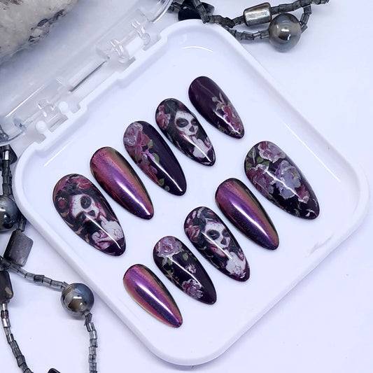 Gorgeous darkest purple press on nails with pink roses, pink/gold colour shift chrome and Halloween vibes. Finished in gloss top coat