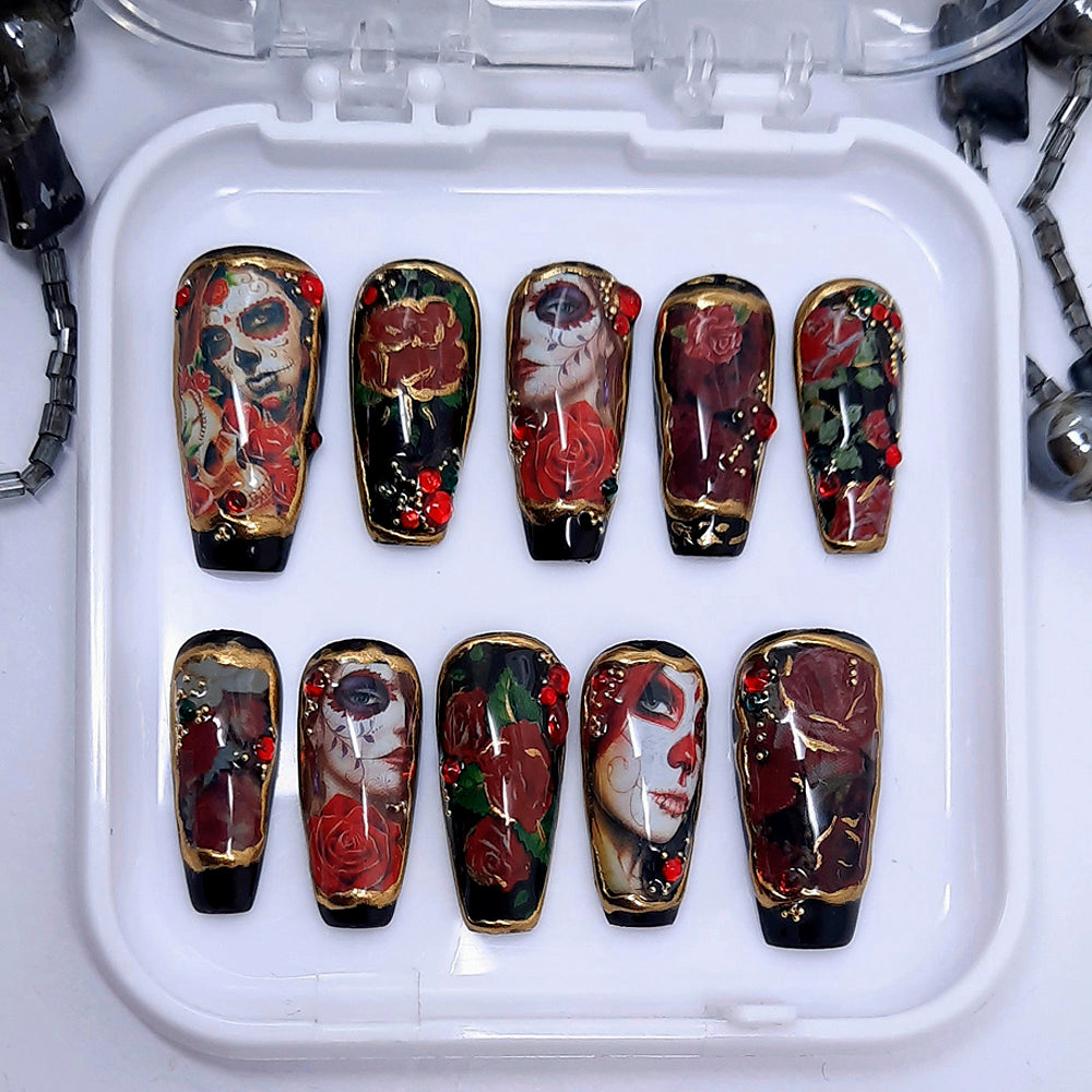 Gorgeous black press on nails with a stunning Day of The Dead design, 3d nail art and gold chrome. Finished in gloss top coat.