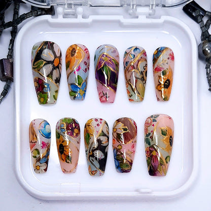 Set of floral nail art designs in a white tray