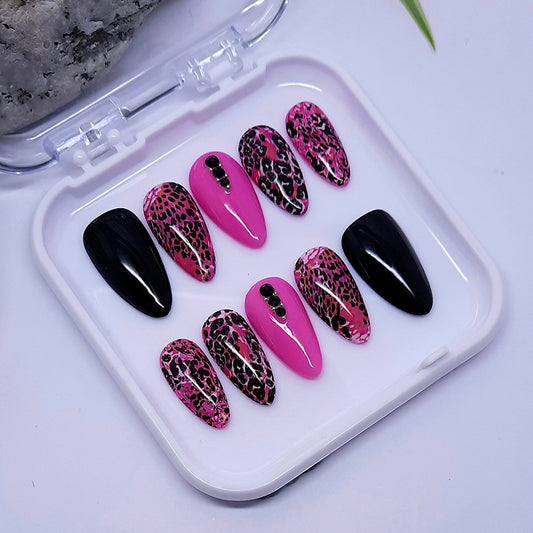 hand made black and pink animal print press on nails with black studs