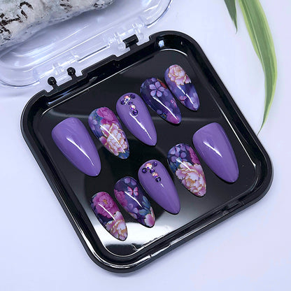 pretty hand made purple press on nails with flowers and gems