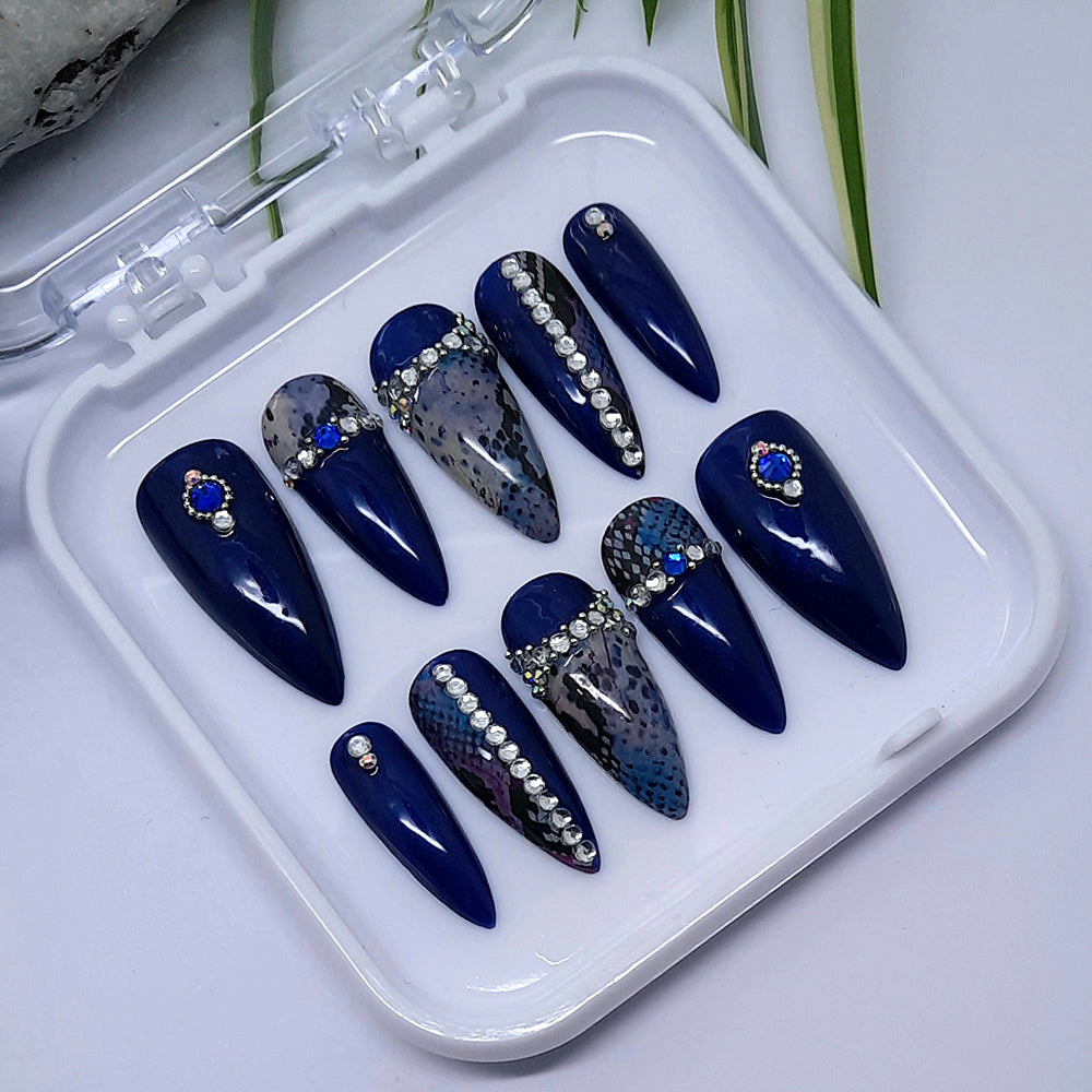 gorgeous sparkling dark blue press on nails with snakeskin and crystals