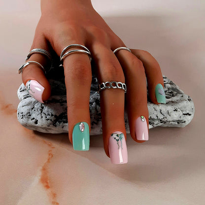 20 press on nail set in pink and green short square with butterflies and gems